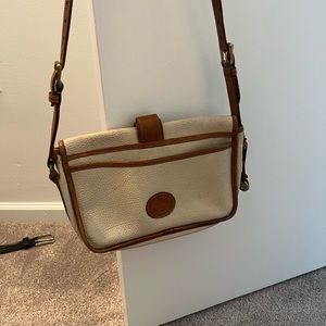 Dooney and Bourke classic ivory leather handbag.